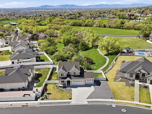 Aerial view of residential area with a mountainous background