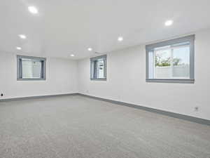 Basement featuring carpet flooring and recessed lighting