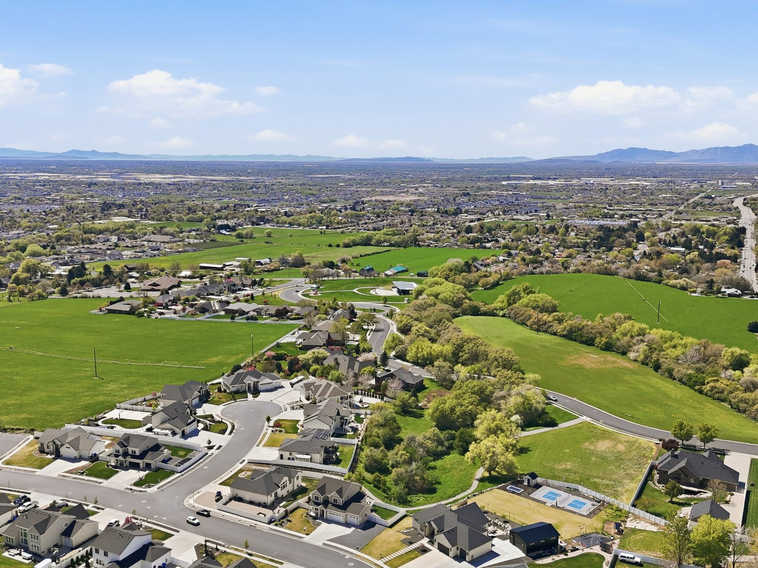 Aerial view of residential area with mountains