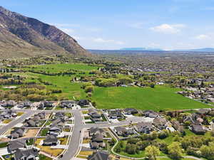Aerial view of residential area with a mountain backdrop