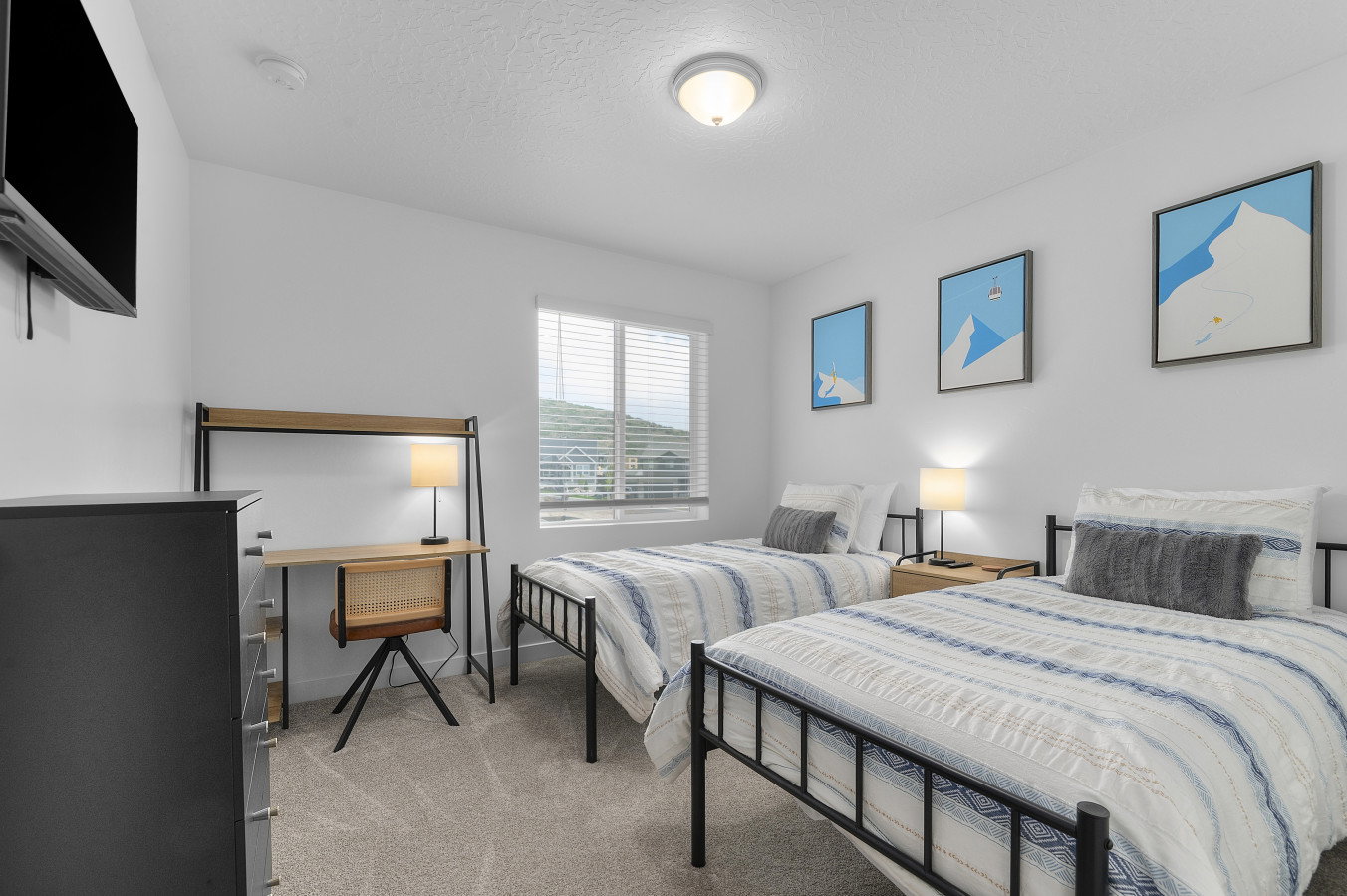 Bedroom 2. Offering twin beds with a walk in closet.
