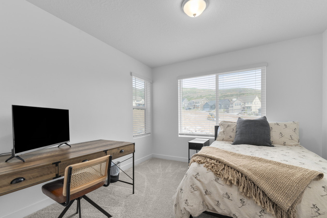 Bedroom 3. Facing east overlooking green open space. Light and bright with walk in closet.