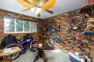Garage featuring a ceiling fan