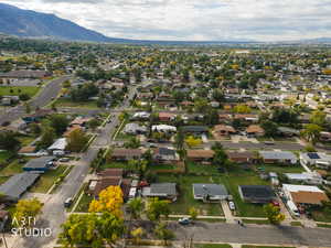 Aerial view of residential area with a mountain backdrop