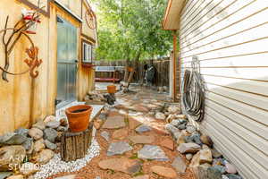 Fenced backyard featuring a patio area