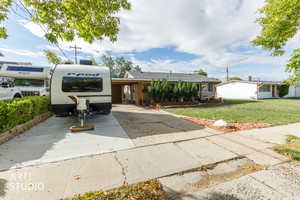 View of front of property with a front yard