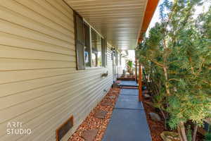 View of home's exterior featuring a porch