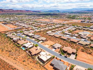 Aerial perspective of suburban area with mountains