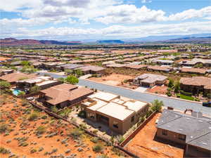 Aerial view of residential area with a mountain backdrop