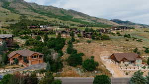 View of mountain backdrop with nearby suburban area