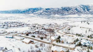 View of mountain backdrop with nearby suburban area