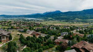 Aerial view of residential area with a mountainous background