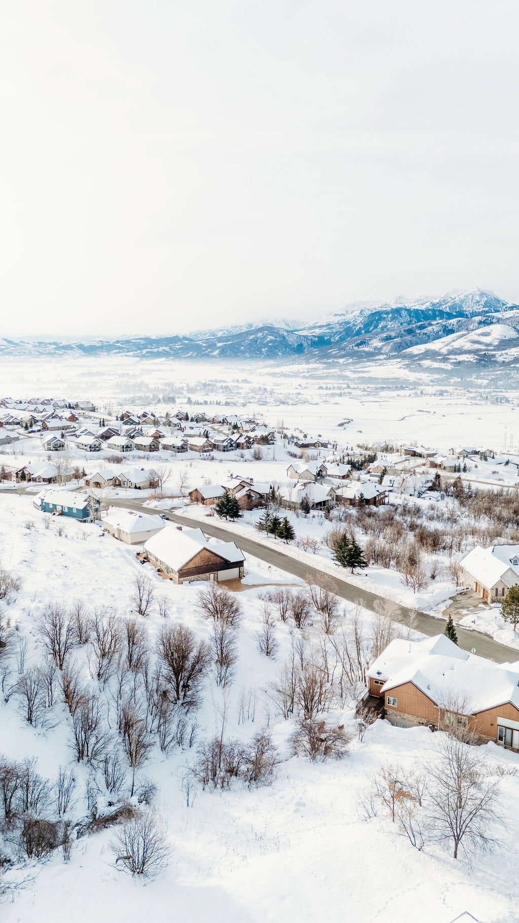 Mountain view featuring nearby suburban area