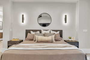 Wake up to breathtaking mountain views in this serene primary suite, designed for comfort and privacy.