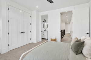 Spacious upper-level bedroom featuring a private en-suite bathroom, offering comfort, privacy, and flexibility for guests or family members.