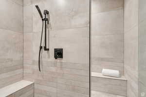 A spacious walk-in shower, and a calming, retreat-like atmosphere.