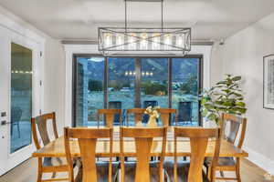 Enjoy dining with breathtaking mountain views as your backdrop. This light-filled space offers a warm and inviting setting.