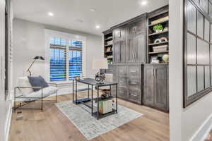 Dedicated home office with custom built-ins, providing a functional and stylish workspace ideal for remote work or study.