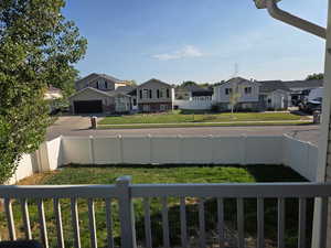 Balcony featuring a residential view