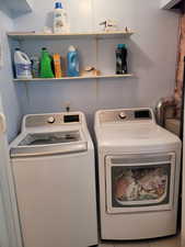 Laundry area featuring washing machine and dryer