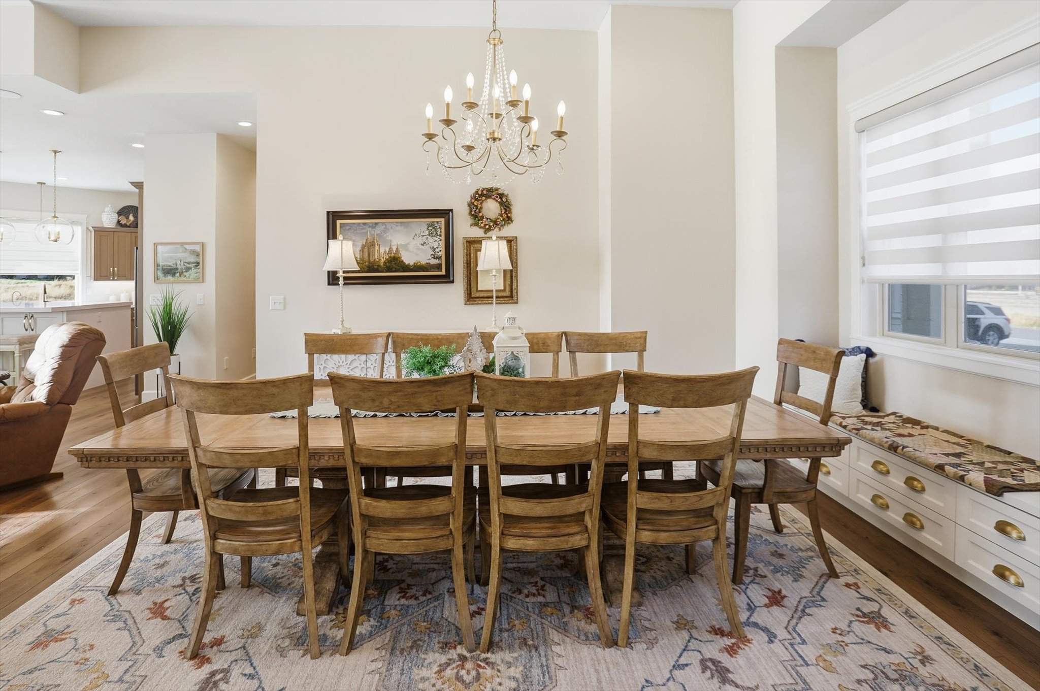Dining space featuring hanging lights and light wood-style floors