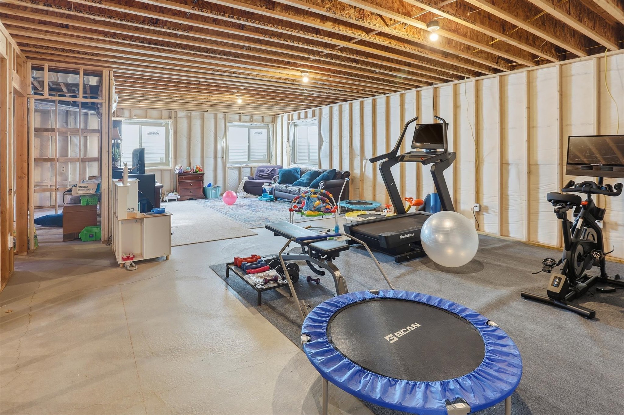 Exercise area with concrete flooring