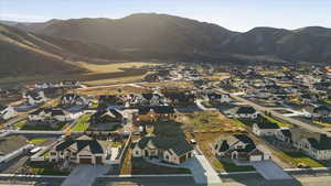 Aerial view of residential area featuring mountains