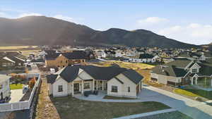 View of mountain backdrop with nearby suburban area