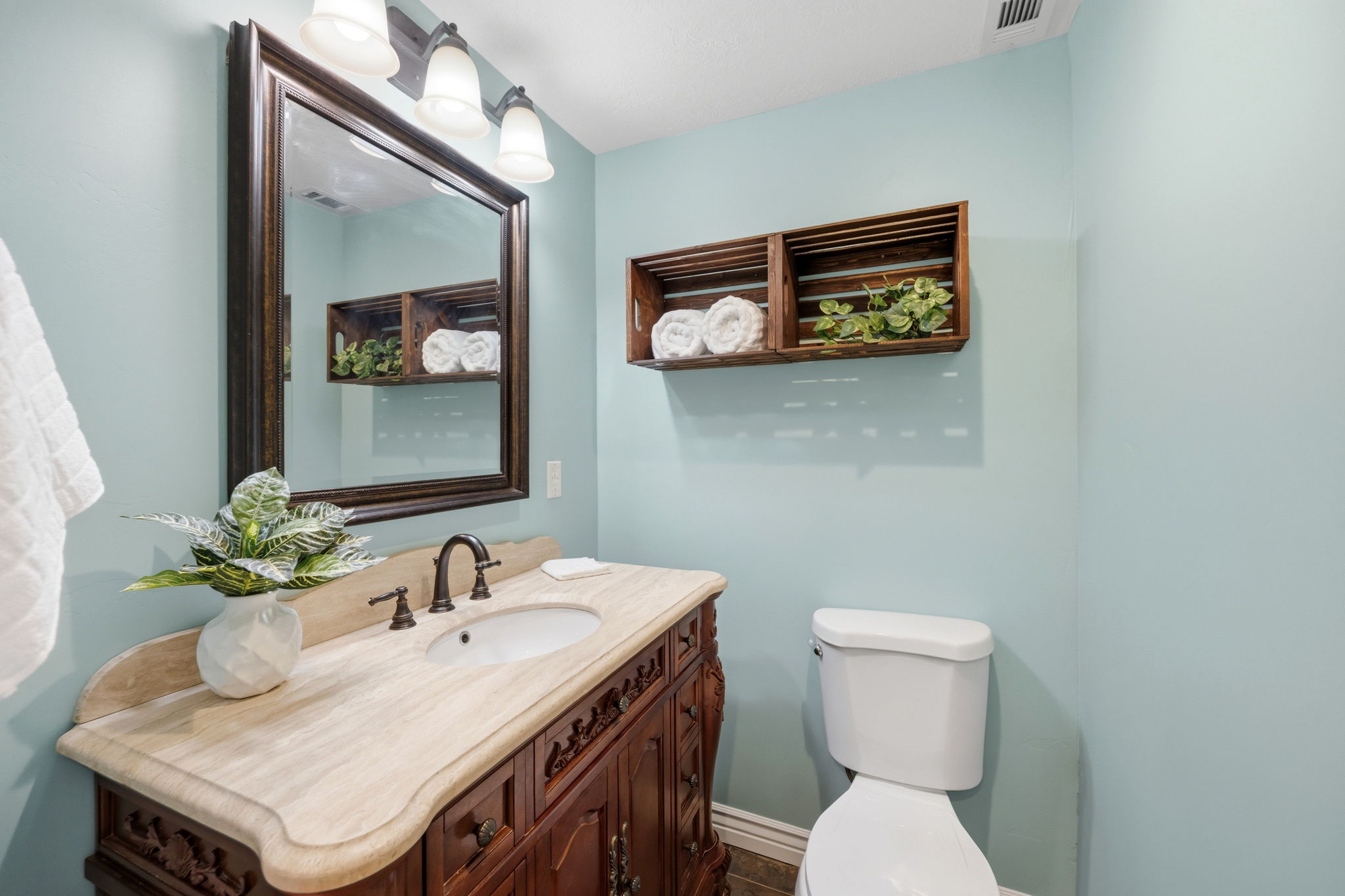 Half bath with toilet and vanity