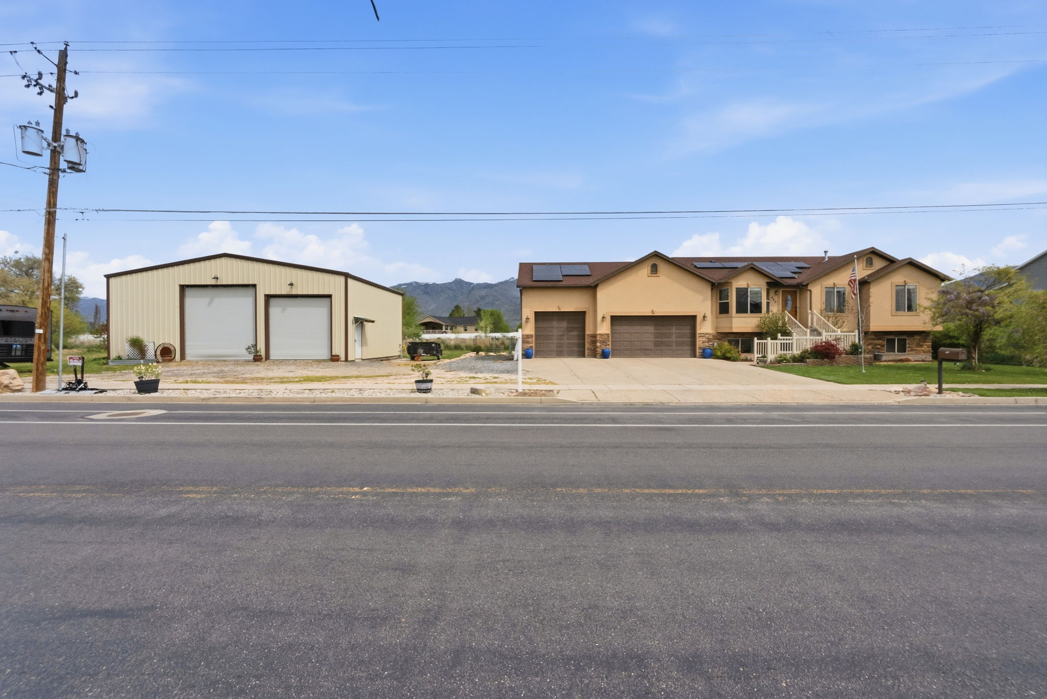 Home with 3 car garage and 1440 sq ft workshop plus solar panels