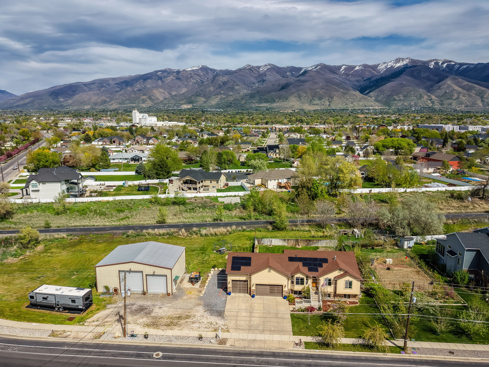 Aerial view of residential area with a mountainous background