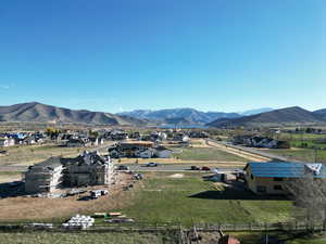 View of mountain background featuring rural landscape