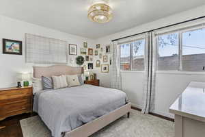 Bedroom with wood finished floors
