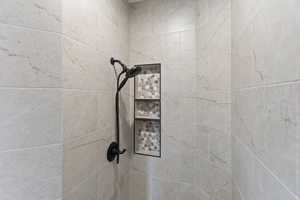Bathroom view of tiled shower