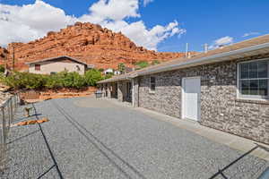 View of patio / terrace with grilling area and a mountain view