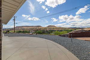 View of patio with a mountain view
