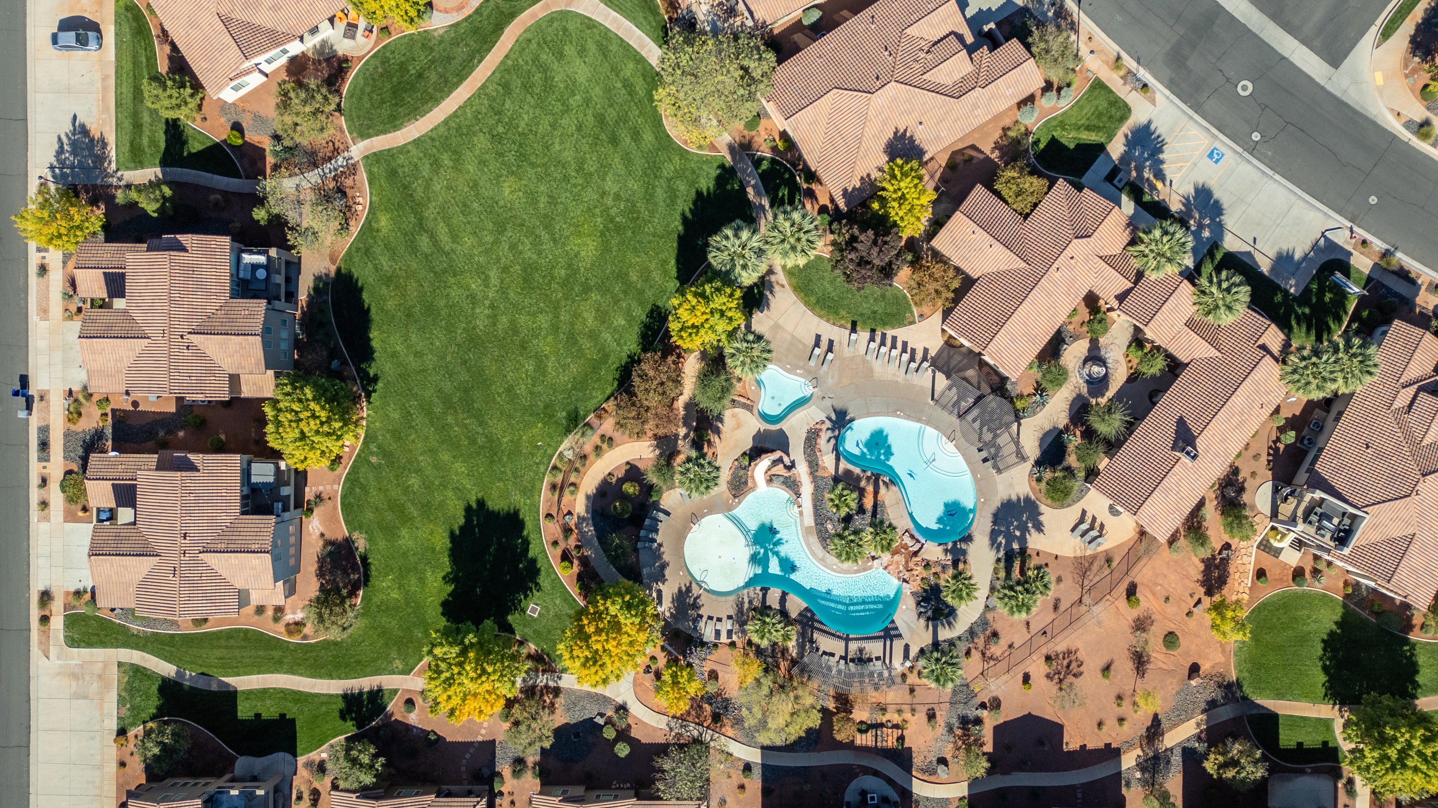 Aerial view of residential area with a pool