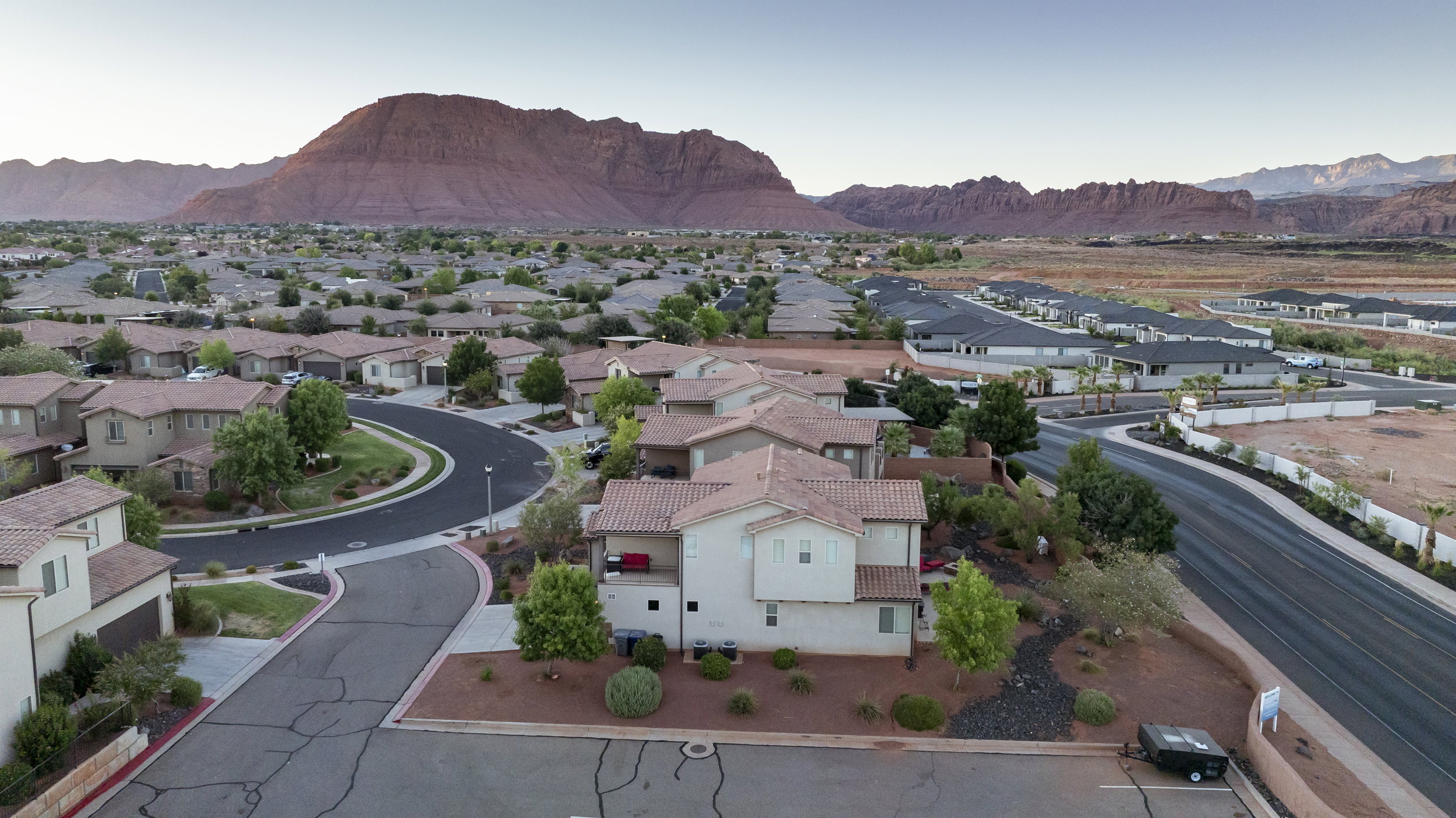 Aerial view of residential area with a mountainous background