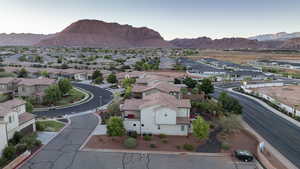 Aerial view of residential area with a mountainous background
