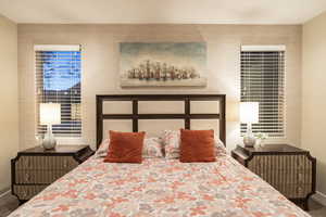 Bedroom featuring an accent wall