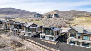 Aerial view of residential area with a mountainous background
