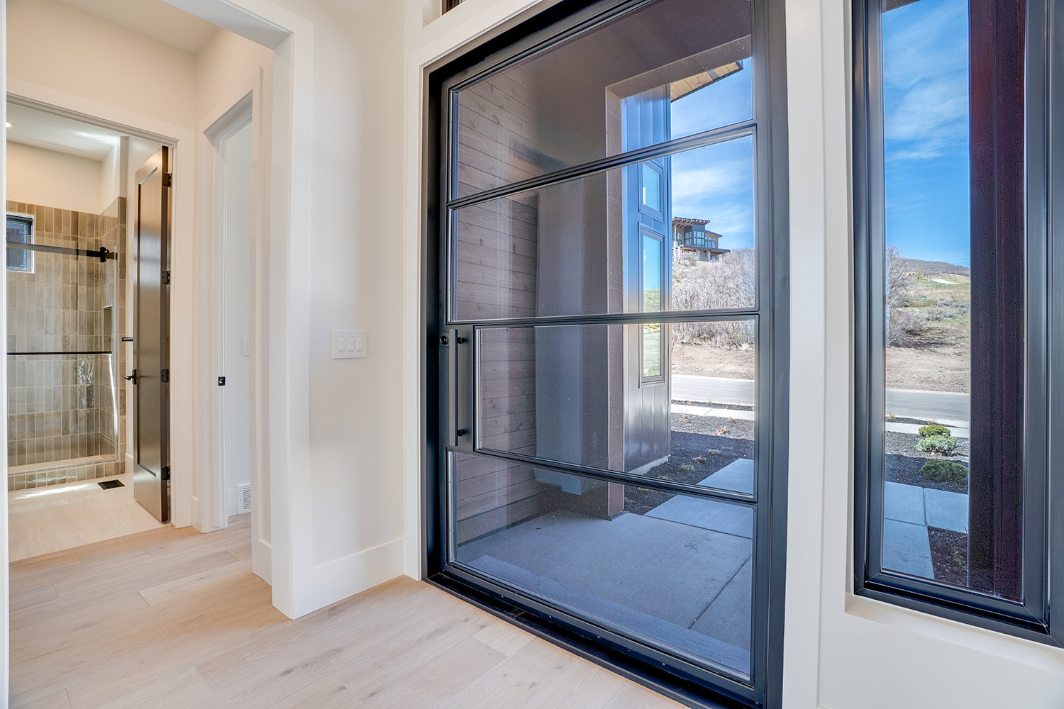 Doorway featuring wood finished floors