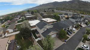 Aerial view of residential area with a mountain backdrop