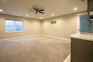 Unfurnished room featuring light carpet, recessed lighting, and ceiling fan