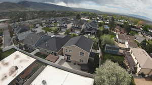 Aerial view of residential area featuring mountains