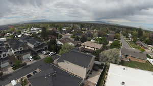 Aerial perspective of suburban area with mountains