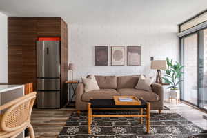 Living area featuring wood finished floors