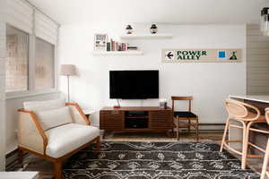 Sitting room with wood finished floors