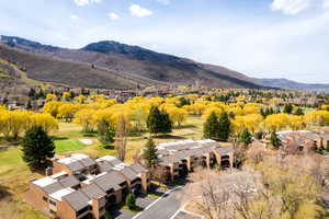 View of mountain backdrop with a local golf course