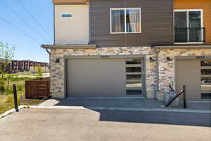 Garage featuring driveway